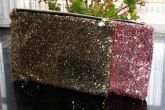 Bolsa de mão de paete dourada